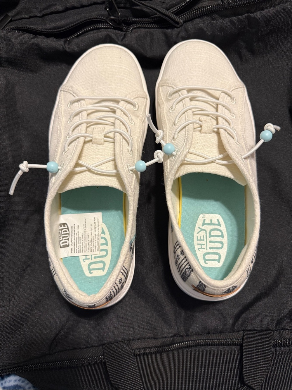 Hey Dude Cream Canvas Sneakers with Light Blue Accents